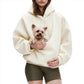 Front view of the light gray plush fleece pet pouch hoodie with lined hood and drawstring