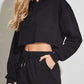 Cropped hoodie jogger set shown worn for a relaxed lounge moment