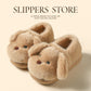 Plush puppy face home slippers in soft faux fur with an open back and thick EVA sole on a home floor