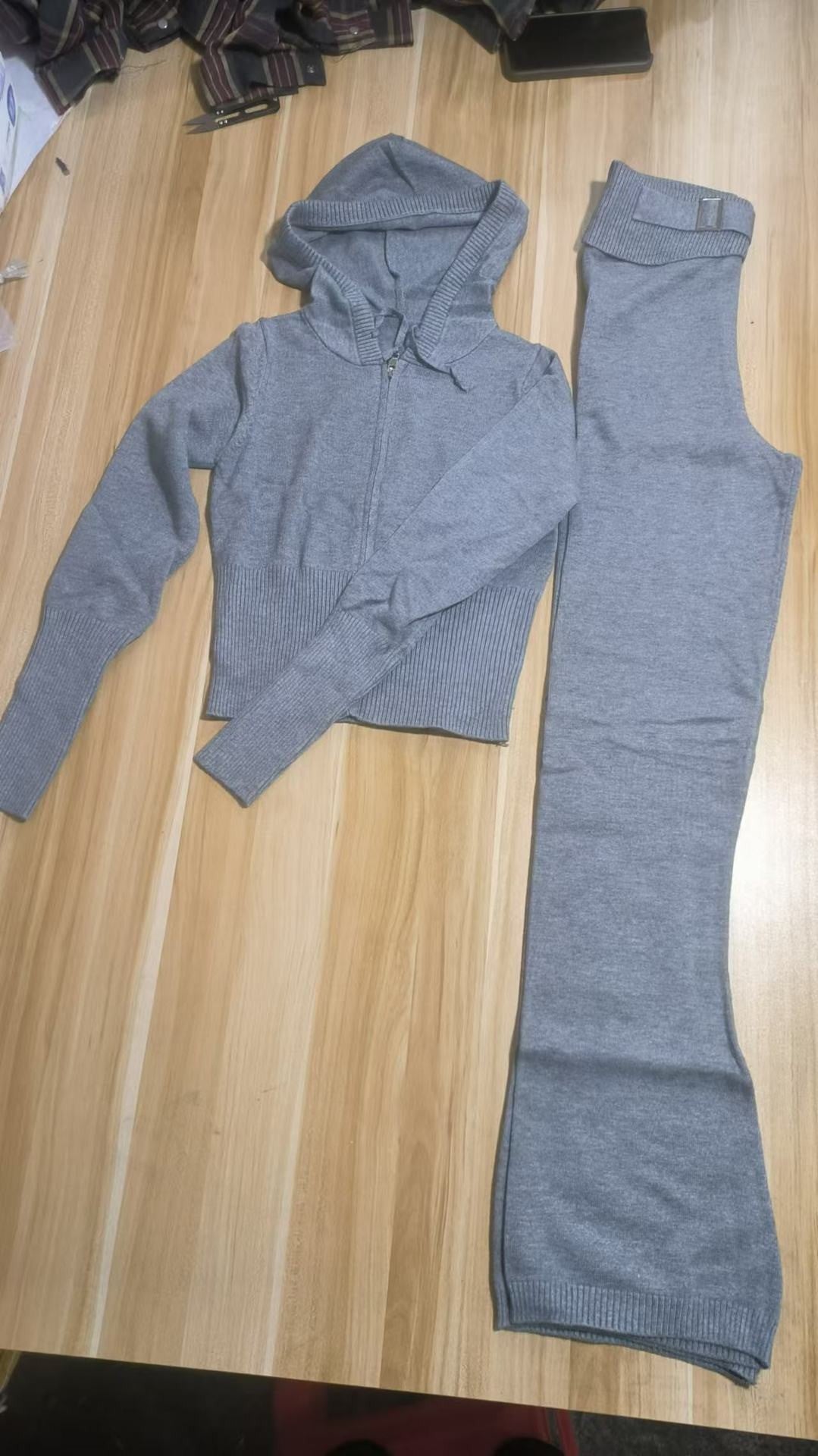 Model standing in the full knit set from head to ankle