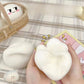 Japanese moldable slow-rebound squeeze bun toy, soft squishy fidget toy held in one hand