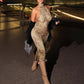 Leopard print halter maxi dress worn on the street, sleeveless and full length