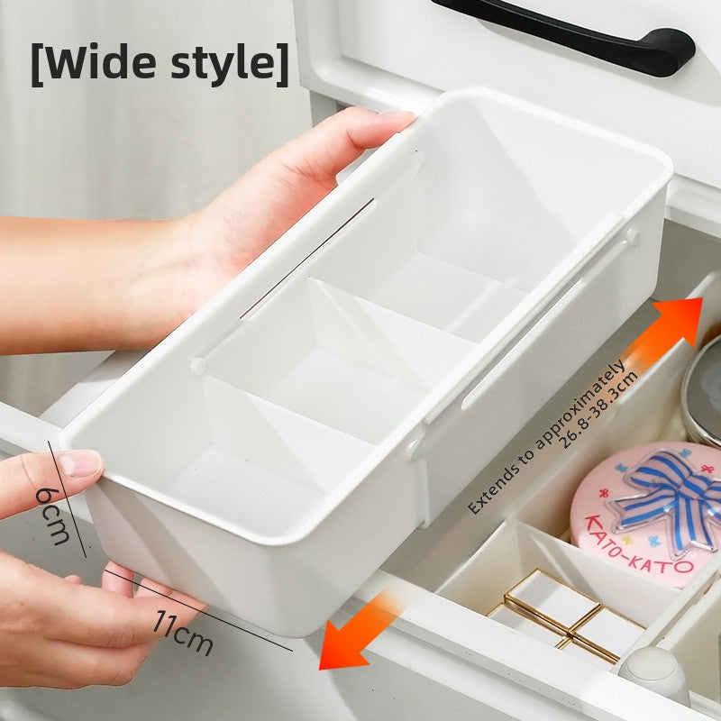 Wide white drawer organizer box measuring 11 cm wide and 6 cm tall held above a drawer