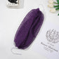 Exfoliating bath net stretched out to show its full length and handles