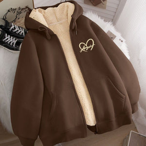 Front view of the fleece zip hoodie with the cream sherpa lining visible along the open zip