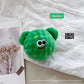 Plush squeaky dog toy in a textured corn velvet body, one design from the assorted shape range