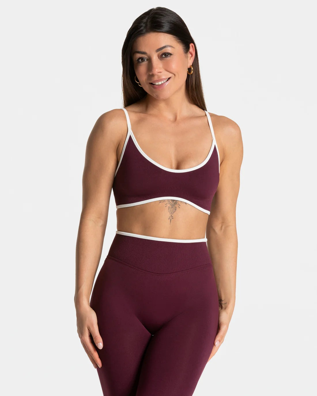 Scoop bralette and ribbed high-waist leggings in the four-piece yoga set