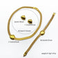 Close-up of the imitation gold three-piece set showing the smooth plated gold-tone surface