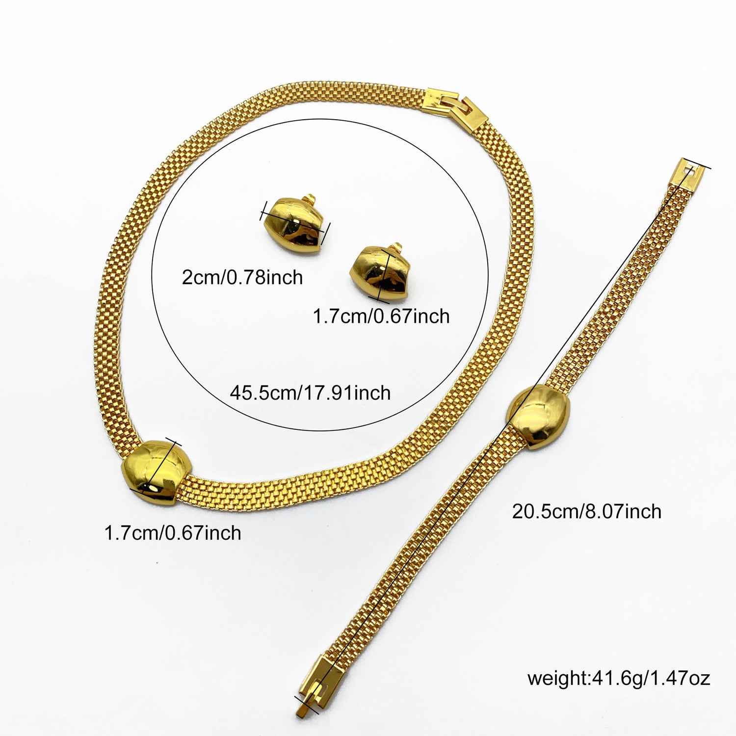Close-up of the imitation gold three-piece set showing the smooth plated gold-tone surface