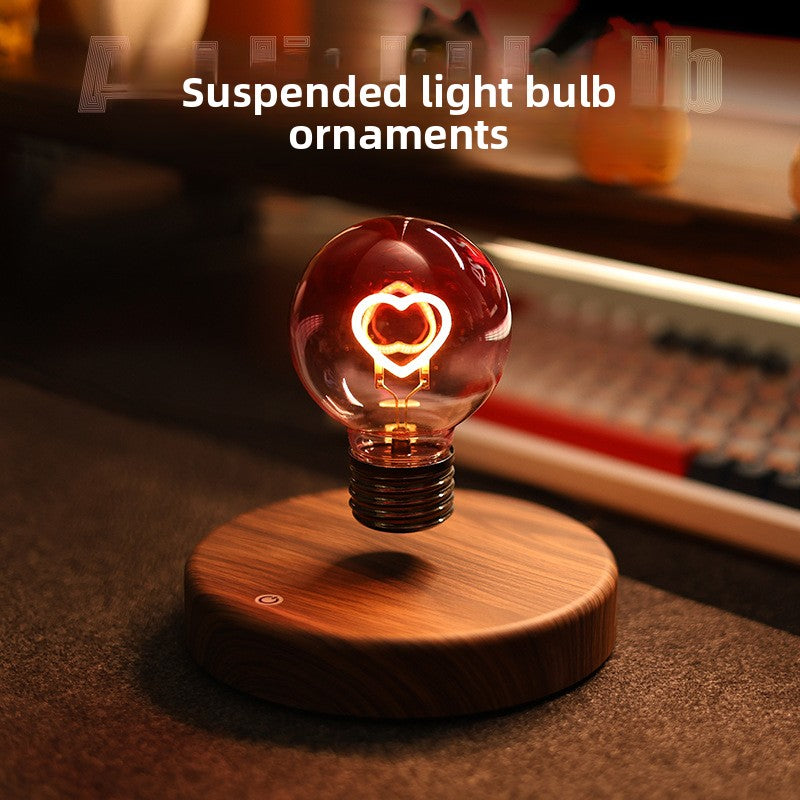 Levitation LED bulb floating above a round wood grain base on a desk with a warm heart glow