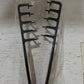 Lightweight plastic styling comb for bangs and short mens cuts on a plain background