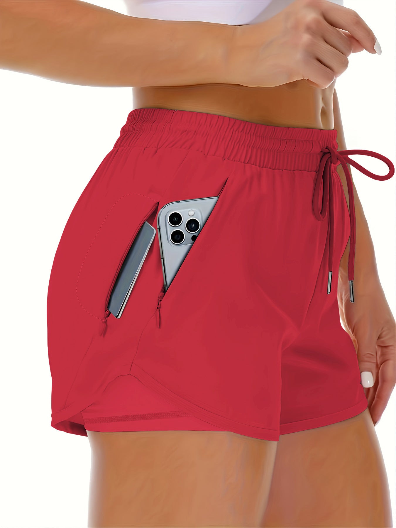 A dark gray womens two in one fitness shorts with a side phone pocket and inner liner, front view (2)