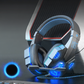 Gaming headset with blue LED glow accents on a dark desk surface