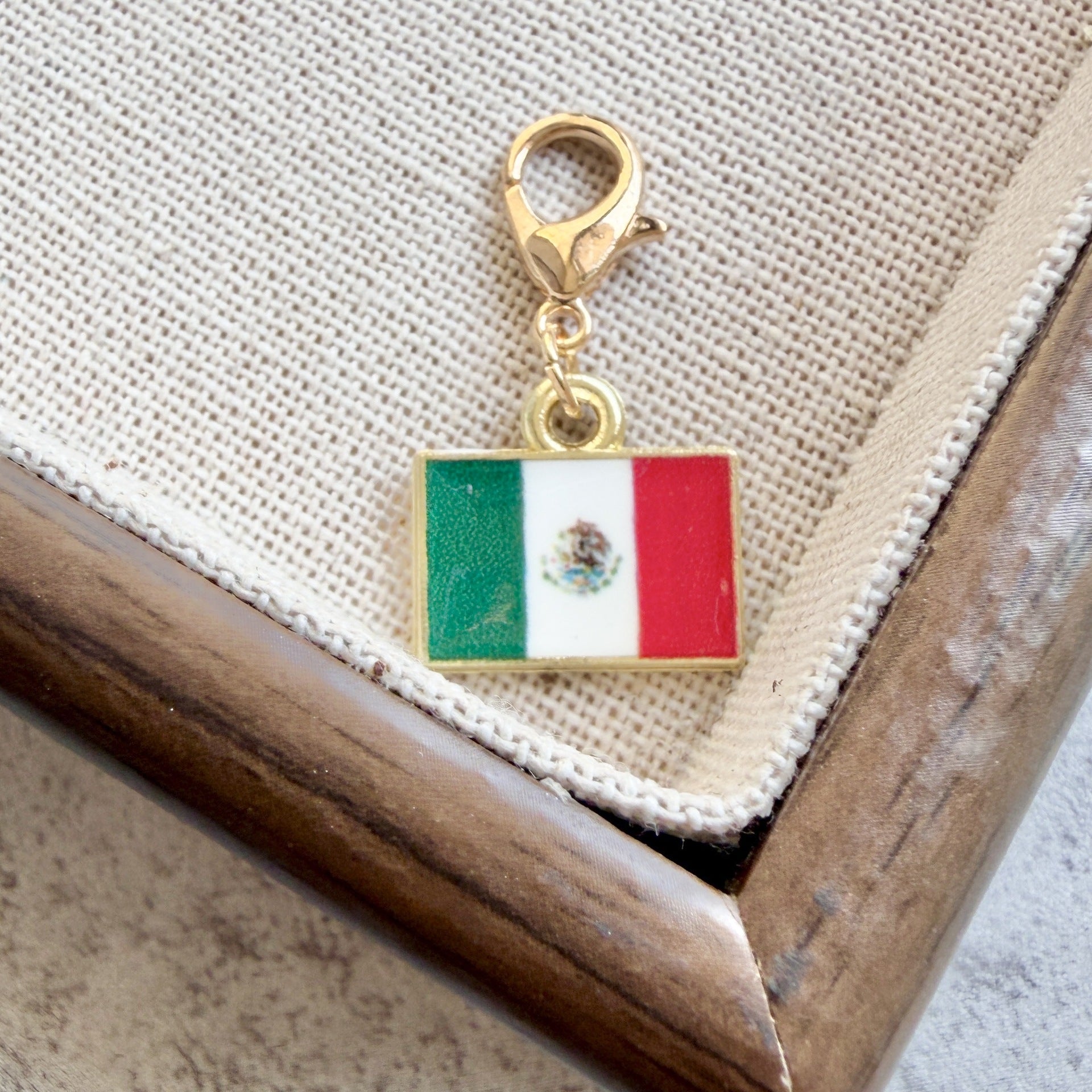 Mexico enamel country flag keychain charm on a gold tone lobster clasp for keys and bags