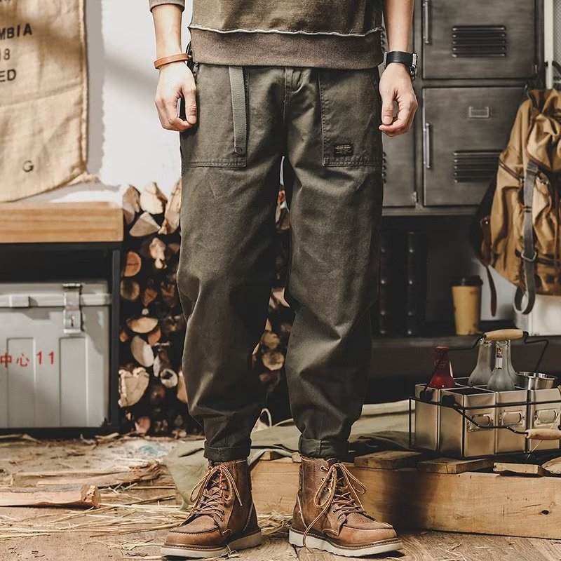 Close up of the woven cotton blend fabric and stitching on the cargo pants