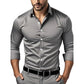 Close view of the turn down collar and button front on the slim fit polyester dress shirt