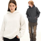 A woman in a white pullover hoodie and a man in a charcoal hoodie, both with wide trousers, on a white background
