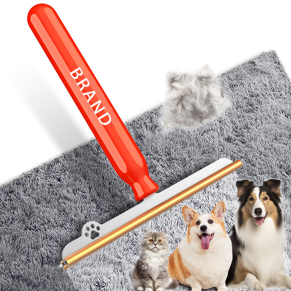 Short handle small pet hair remover brush with an orange handle on a gray carpet beside a cat and two dogs