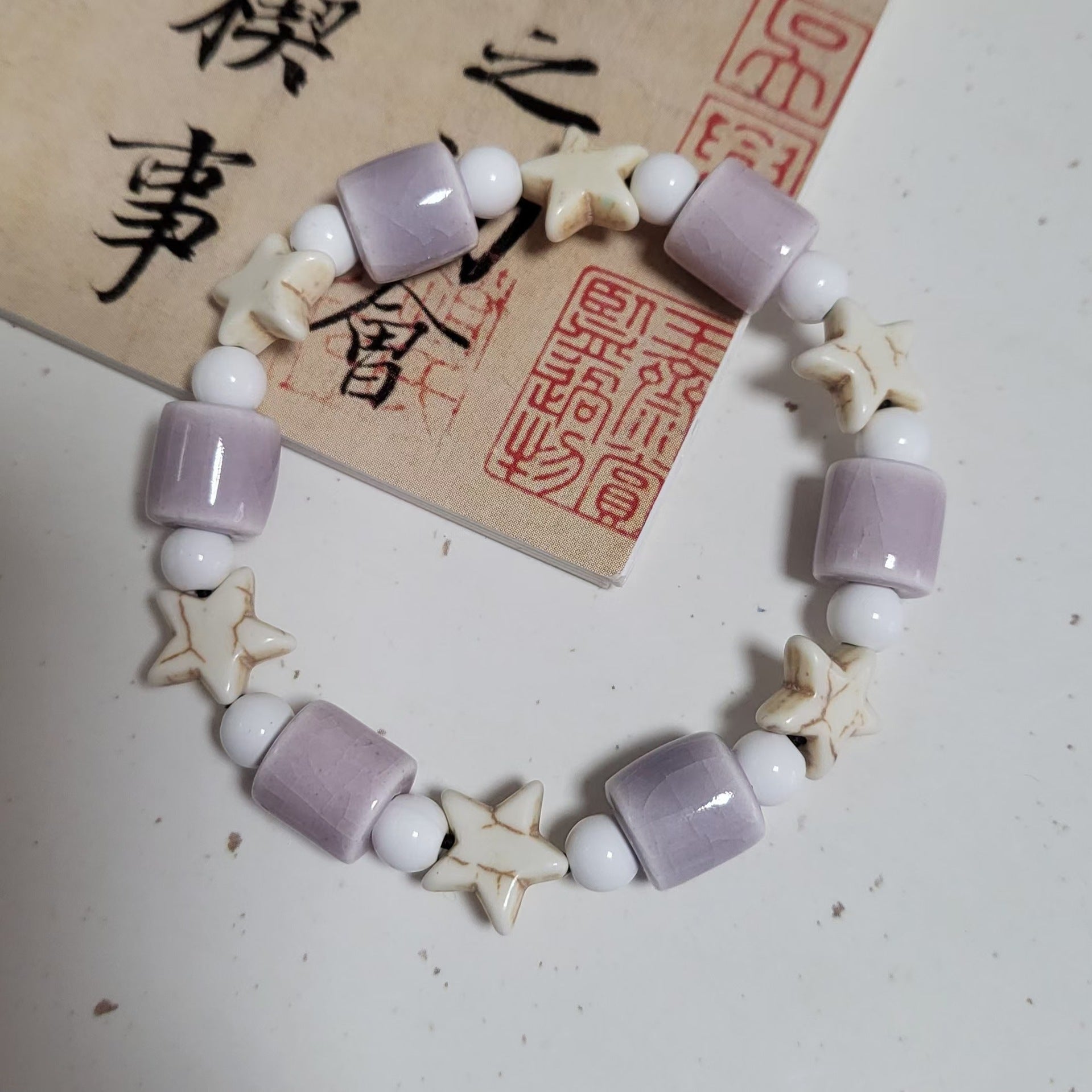 Handmade Ceramic Beads Strand | context with companion items