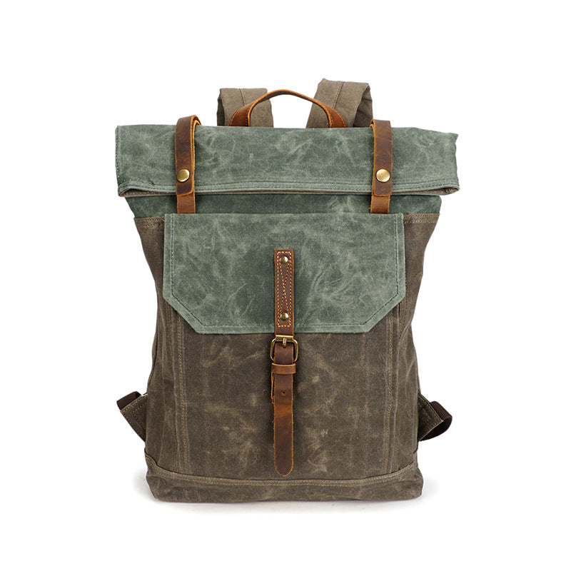 Olive Green and Teal Green canvas roll-top backpack front view with brown buckle strap