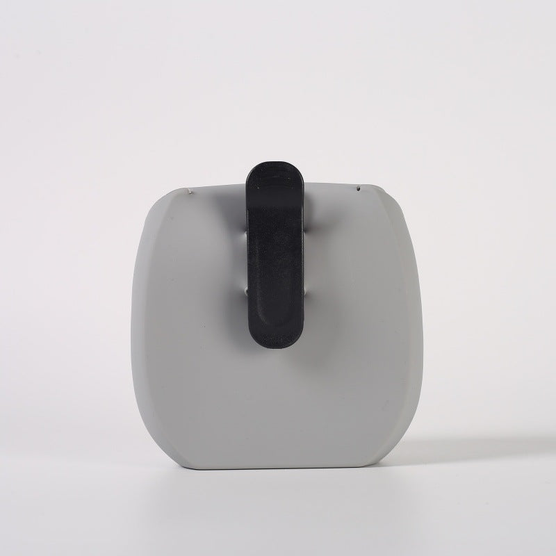 Silicone dog treat pouch shown from the front with its rounded magnetic flap