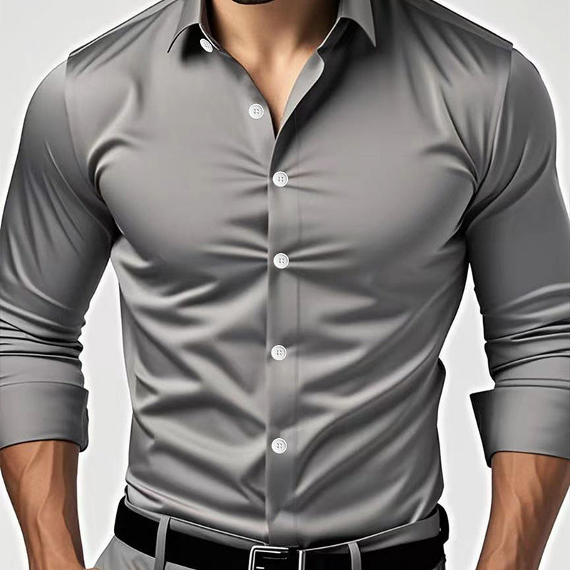 Slim fit button up dress shirt shown on a male model in a solid color with buttoned cuffs