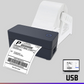 Thermal label printer shown with its power adapter and USB cable