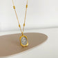 Satellite cable chain and rose engraved stainless steel pendant shown in full length