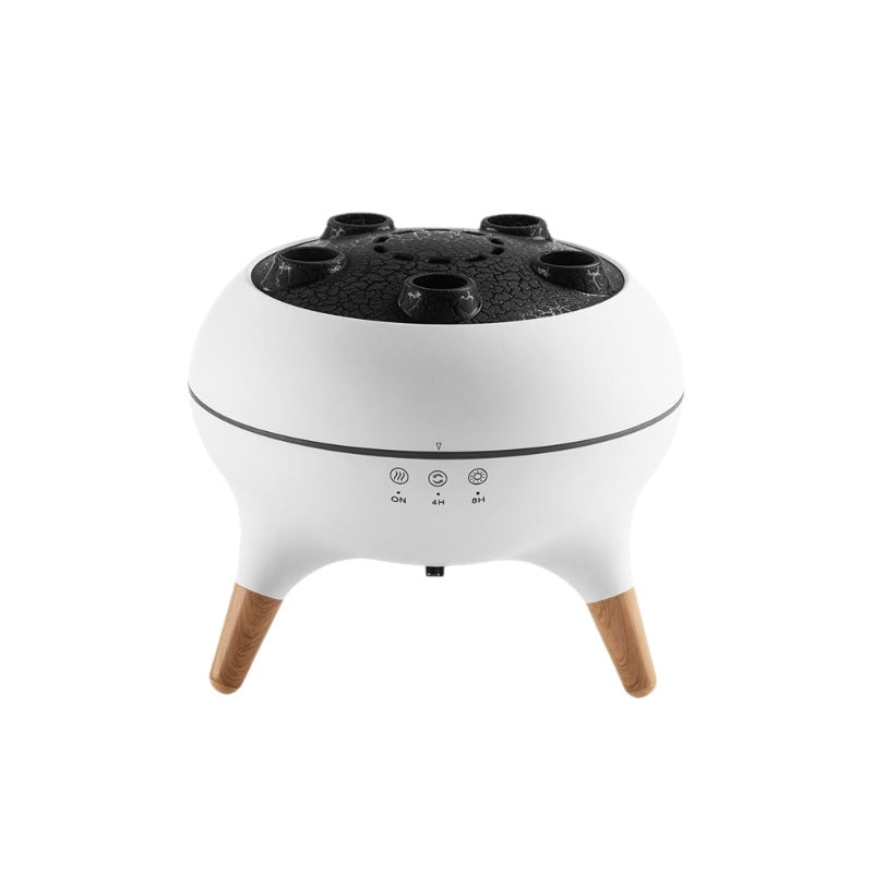 Multifunctional Aroma electric diffuser misting on a nightstand in a room
