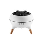 Multifunctional Aroma electric diffuser misting on a nightstand in a room