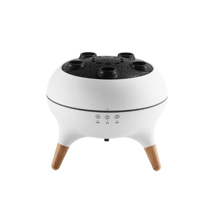 Multifunctional Aroma electric diffuser misting on a nightstand in a room