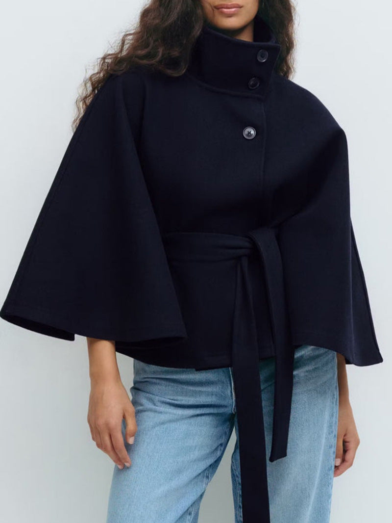 Brown belted cape jacket knotted at the waist with a buttoned stand collar and cape sleeves