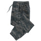 Close view of the cargo pocket and camouflage print on the lightweight jogger pants