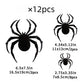 Black PVC bat stickers of mixed sizes laid out on a light background