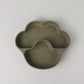 Army green bear paw plate alone, with a wide pad and a toe section, on a gray background