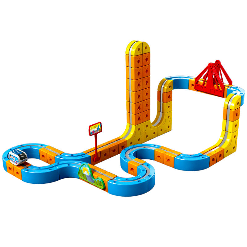 Assembled magnetic track set with a bridge piece and one white electric railcar on a plain background