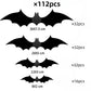 Single large black 3D bat wall sticker with wings folded off the wall