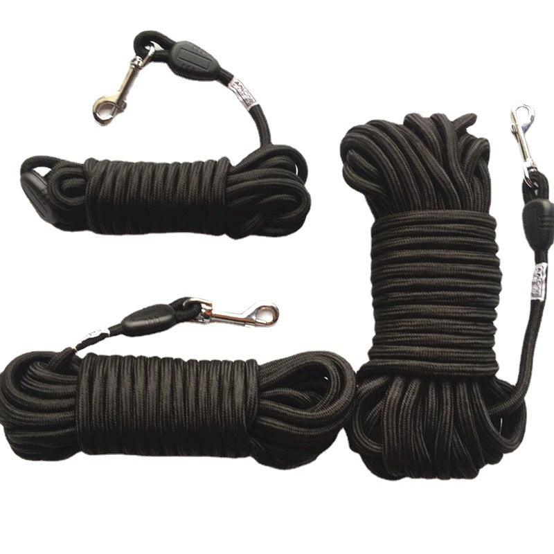 Three black round nylon dog training long lines coiled with metal swivel snap clips