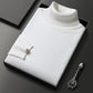 Men's slim-fit turtleneck sweater on a plain studio background