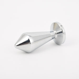 Front view of the curved metal anal plug with its tapered tip and rounded base