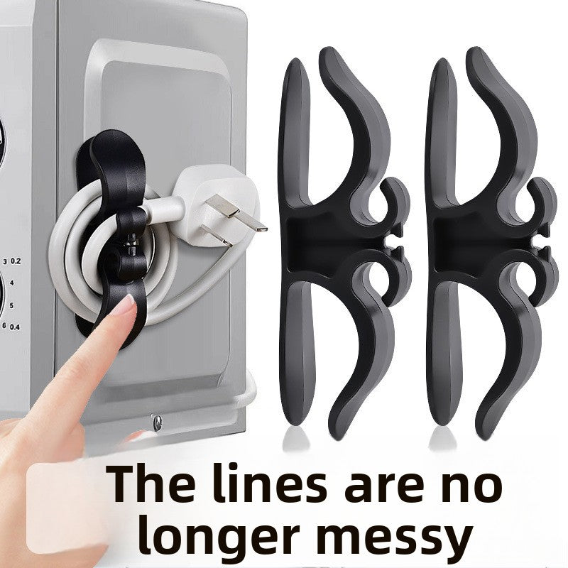 Cord winder holding a wound appliance cable and plug on the side of an appliance
