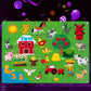 Farm themed felt story board on a blue backdrop with felt barn, tractor and farm animal pieces