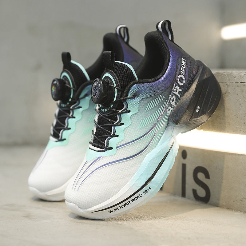Side profile of the kids sneaker showing printed sport graphics and the flexible rubber outsole