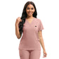 Jogger scrub pants with a drawstring waist and cuffed ankles on a model