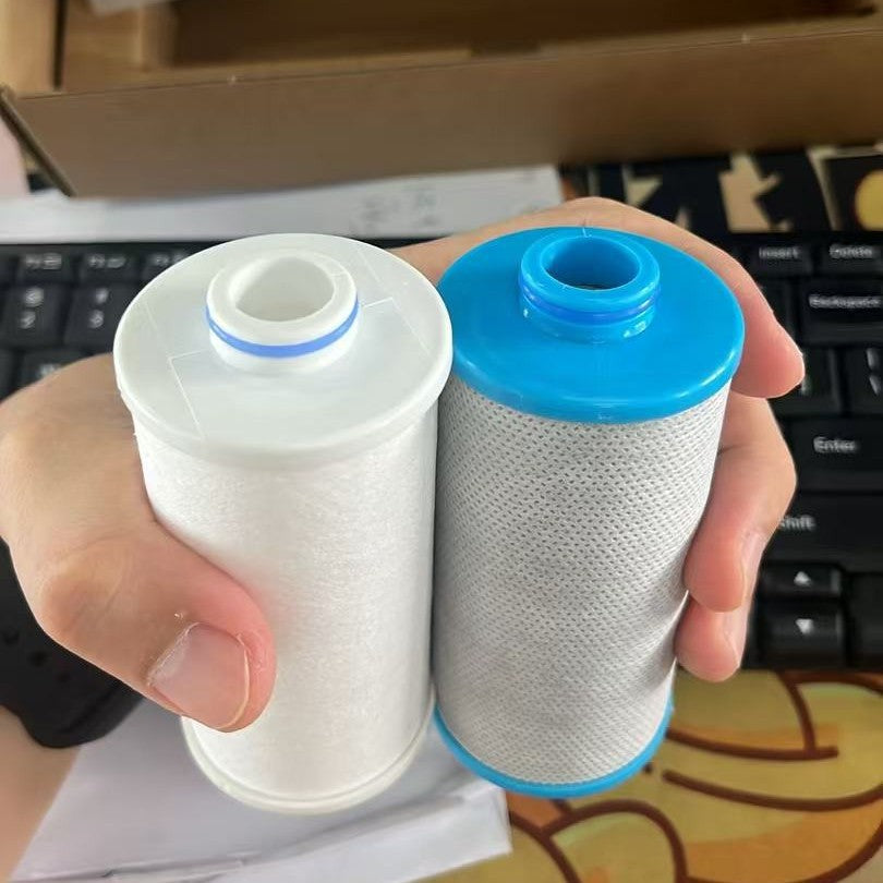 Option Filter cotton and filter core 2-pack: a white cartridge and a blue capped cartridge held together in one hand