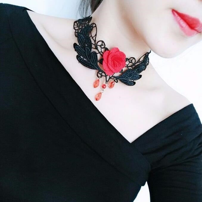 Lace choker necklace with an alloy filigree centre and small dangling beads