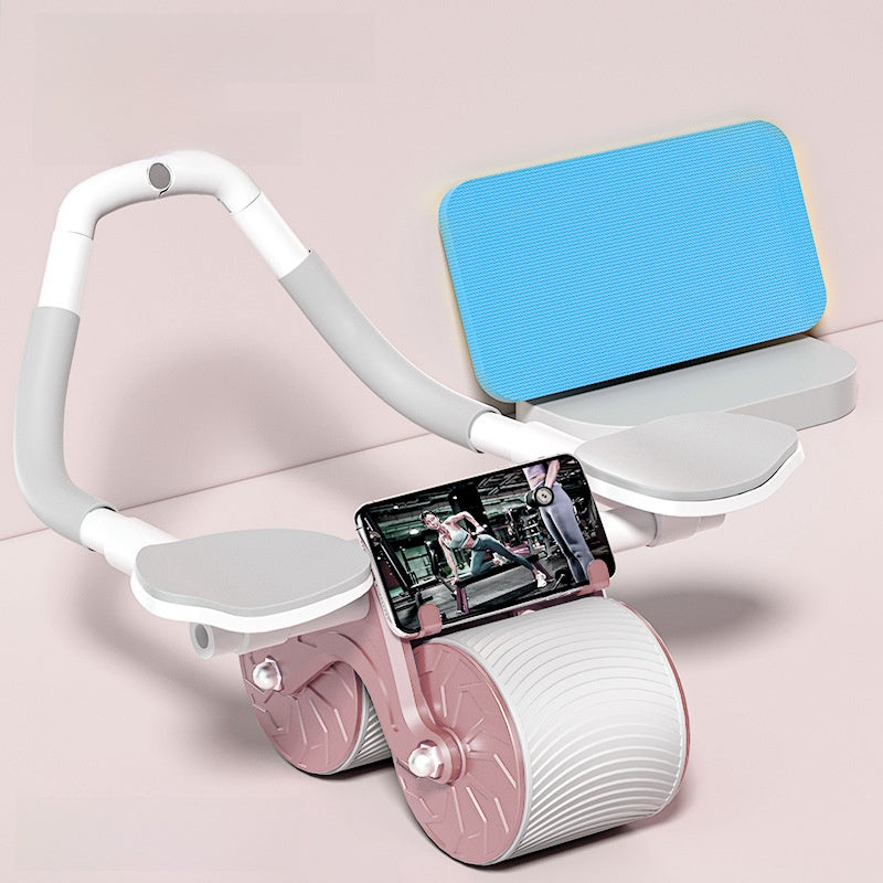 Pink and white elbow support ab roller with phone clip and blue kneeling mat behind