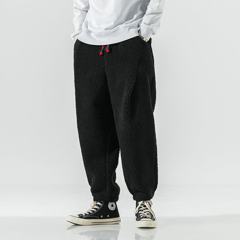 Black plush harem pants with drawstring waist and tapered ankle cuffs, size 4XL option photo