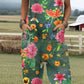 Sleeveless dungaree jumpsuit in a digital print with two deep front pockets