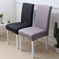 Black and light grey diamond jacquard chair covers on two dining chairs
